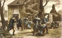 Carte postale colorisée représentant des soldats en train de tirer au fusil portant le titre "L'Attaque du village"
