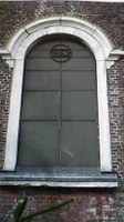 Moignelée : fenêtre de l'Eglise avec mention d'une date